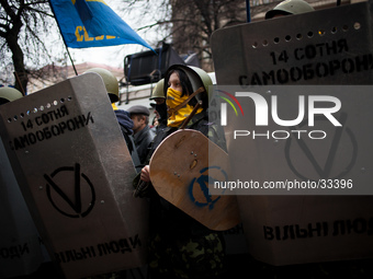 A anti-government protester woman take part in demonstration on Maidan square in Kiev on February 13, 2014. Russia will release the next ins...