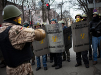 Anti-government protesters take part in demonstration on Maidan square in Kiev on February 14, 2014. Russia will release the next installmen...