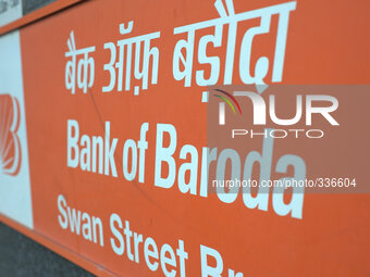 A sign showing the prescence of the Bank of Baroda in central Manchester. (