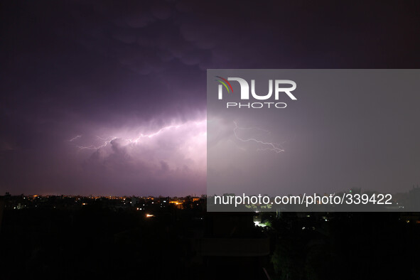 Lightning strikes on November 16, 2014 over the Gaza  town skyline during a thunderstorm early  
