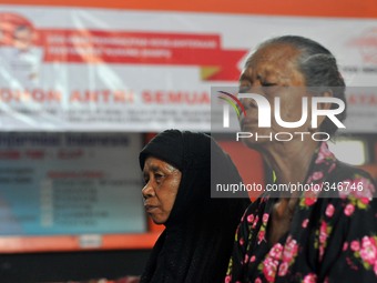 SURAKARTA, INDONESIA - November 21 : Poor peoples queued to take subsidized fuel compensation funds amounting to 16.6 USD (200.000 IDR) per...