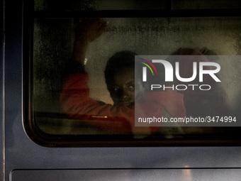 A migrant inside of a van waiting to be transferred to a center. 22-11-2018, Malaga. The Spaniard Maritime vessel rescued in the Mediterrane...