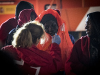 A migrant being attended by a staff of the red cross team. 22-11-2018, Malaga. The Spaniard Maritime vessel rescued in the Mediterranean sea...