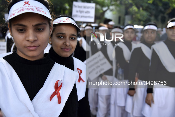 Social activists and nurses participate in an AIDS awareness rally organised by Assam State Aids Control society on the occasion of  World A...