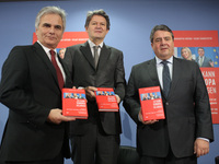 (L-R) Austrian Federal Chancellor Werner Faymann,  Helmut Brandstaetter and German Economy Minister and Vice Chancellor Sigmar Gabriel atten...