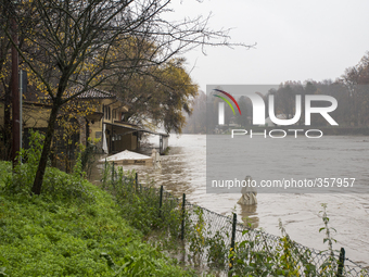 1st December Turin, Italy. The river Po in Turin flooding restaurants and clubs near the muddy waters  after 48 h of continuous rain. (
