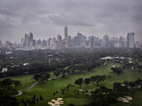 Taguig City Philippines - A view of the business district of Makati City from Taguig City as Typhoon Hagupit (locally known as Ruby) approac...