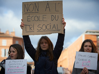 A student holds a placard reading 'No to a school of social selecting'. Several schoolteachers unions and two students unions (UNL, FIDL) ca...