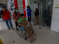 Medical personnel carry out service activities to patients at Anutapura Hospital, Palu, Central Sulawesi, Indonesia, Friday, January 25, 201...