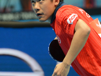 Tang Peng of Hong Kong serves during Men's single of the 2014 ITTF World Tour Grand Finals at Huamark Indoor Stadium on December 12, 2014 in...