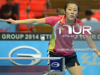 Han Ying of Germany in actions during Women's single of the 2014 ITTF World Tour Grand Finals at Huamark Indoor Stadium on December 12, 2014...