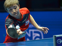 Feng Tianwei of Singapore in actions during Women's single quarter final round of the 2014 ITTF World Tour Grand Finals at Huamark Indoor St...
