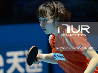 Seo Hyowon of South Korea in actions during Women's single semi-final round of the 2014 ITTF World Tour Grand Finals at Huamark Indoor Stadi...