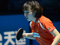Seo Hyowon of South Korea in actions during Women's single semi-final round of the 2014 ITTF World Tour Grand Finals at Huamark Indoor Stadi...