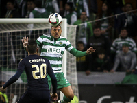 Sporting's defender Mauricio (R) vies with Moreirense's forward Ramon Cardozo during the Portuguese League  football match between Sporting...