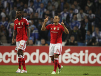 PORTUGAL, Porto: Benfica's Brazilian forward Lima (R) celebrates after scoring a goal during Premier League 2014/15 match between FC Porto a...