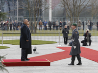Angela Merkel, German chancellor, welcomes Boyko Borisov, Prime Minister of Bulgaria, with military honors at the German chancellery on Dece...