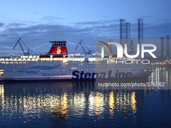 Gdynia, Poland 16th, Dec. 2014 Scenes at the Naval Shipyard in Gdynia. Stena Line ferry goes to Gdynia Ferry Terminal (