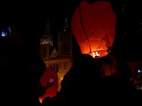 Performance releasing lanterns into the air in winter night. It was initiated by academic painter and graphic artist Kresimir Tadija Kapulic...
