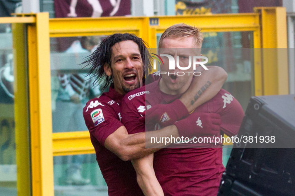 Torino defender Kamil Glik (25) celebrates after scoring his goal with Torino forward Amauri de Oliveira (22) during the Serie A football ma...