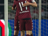 Torino defender Kamil Glik (25) and Torino midfielder Alessandro Gazzi (14) celebrate victory after the Serie A football match n.16 TORINO -...