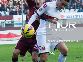 Genoa forward Alessandro Matri (32) fights for the ball against Torino defender Matteo Darmian (36) during the Serie A football match n.16 T...