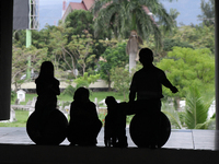 Residents enjoy the atmosphere silhouette Aceh Tsunami Museum welcomes 10 years of the tsunami in Banda Aceh, Indonesia, on December 26, 201...