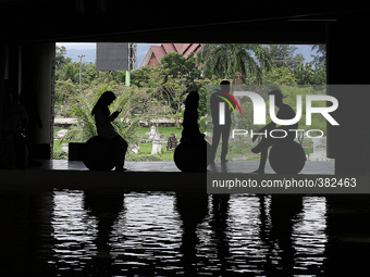 Residents enjoy the atmosphere silhouette Aceh Tsunami Museum welcomes 10 years of the tsunami in Banda Aceh, Indonesia, on December 26, 201...