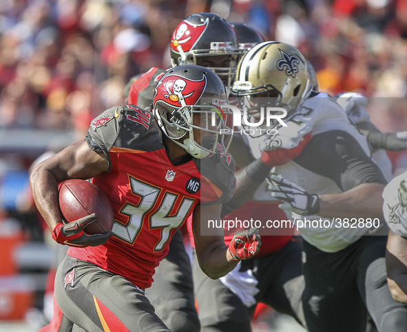 Tampa Bay Buccaneers running back Charles Sims (34) carries against New Orleans during the second quarter December 28 at Raymond James Stadi...
