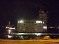 The Italian Navy San Giorgio with rescued passengers of the Norman Atlantic ferry, arrives in Brindisi southern Italy on December 30, 2014....
