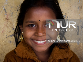 A small girl namely Arju, studies in class two smiles at the camera at a primary school close to Ship Breaking/Building yard in Keraniganj,...