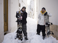 Youth of Locorotondo, in the southern Italian region of Puglia, enjoy a day of snowboarding in the old town of the village,  after a sudden...