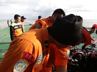 Indonesian SAR on the boat at the sea prepared for diving to find the victim body at Kalimantan Sea. Jan 2nd 2015 (