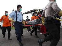 Victim of Plane Air Crash evacuated at Pangkaln Bun Airport-Kalimantan. Jan 3rd 2015 (