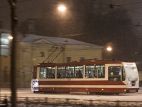 The tram on the streets of St Petersburg during a heavy snowfall. Russia, 08 January 2015 (