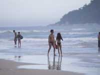 People went to the beach in this cloudy but hot day in Praia do Campeche, Florianópolis, on January 8, 2015. (