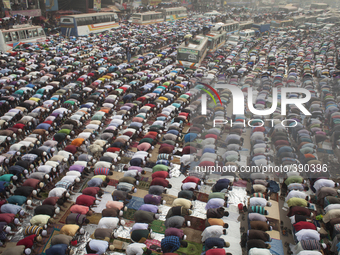Thousands of Muslims attend the Friday prayer in the streets close to the congregration ground during the first day of the three-day long Mu...