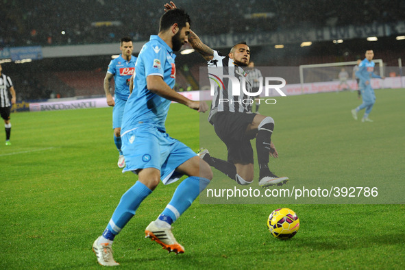 Raul Albiol of SSC Napoli competes for the ball with Vidal Juventus during the italian Serie A football match between SSC Napoli and FC Juve...