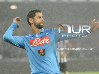 Miguel Angel Britos celebrates after scoring SSC Napoli during the italian Serie A football match between SSC Napoli and FC Juventus at San...
