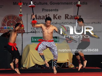 Artist from Manipur performs Thangta Martial Arts at the Maati Ke Rang festival which celebrates the colourful cultural heritage of India at...