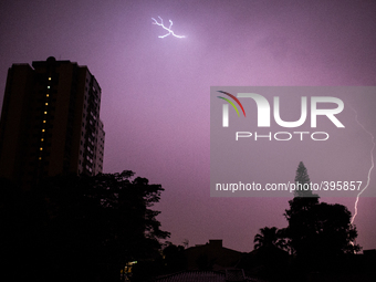 A lightning strikes in the sky during a rainstorm in Sao Paulo, Brazil on 14 January 2015. The heavy rain that came with strong winds left s...