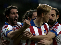  SPAIN, Madrid: Several player of Atletico de Madrid celebrates a goal during the Spanish Kings´cup 2014/15 match between Real Madrid and At...