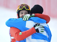 Luca Matteotti from Italy celebrates with his team member, after winning a Gold in Men' Snowboard at FIS Snowboard World Championship 2015 i...