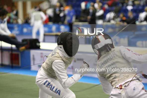 Gdansk, Poland 17th, Jan. 2015 Artus Court 2015 fencing cup in Gdansk. Eliza Do Francisca (ITA)  fights against Rena Sanada from Japan. 