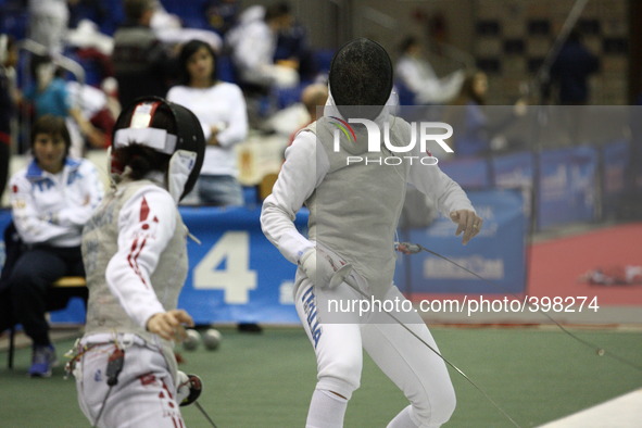 Gdansk, Poland 17th, Jan. 2015 Artus Court 2015 fencing cup in Gdansk. Eliza Do Francisca (ITA)  fights against Rena Sanada from Japan. 