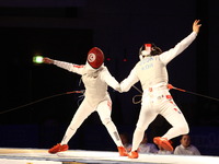 Gdansk, Poland 17th, Jan. 2015 Artus Court 2015 fencing cup in Gdansk. First semi final game. Jeon Hee Sook (Korea) fights against Ines Boub...