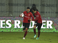PORTUGAL, Penafiel: Penafiel's Portuguese forward Rabiola (L) celebrates after scoring a goal during the Premier League 2014/15 match betwee...