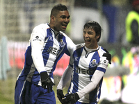 PORTUGAL, Penafiel: Porto's Spanish midfielder Óliver Torres (R) celebrates after scoring a goal with Porto's Brazilian midfielder Casemiro...