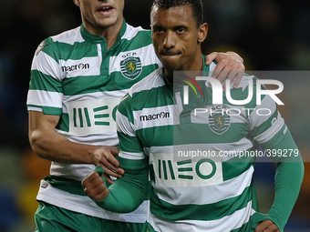 Sporting's midfielder Nani celebrates his goal with Sporting's defender Cedric (L)  during the Portuguese League  football match between Spo...