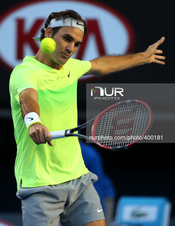(150119) -- MELBOURNE, Jan. 19, 2015 () -- Roger Federer of Switzerland returns the ball during the first round match of men's singles with...